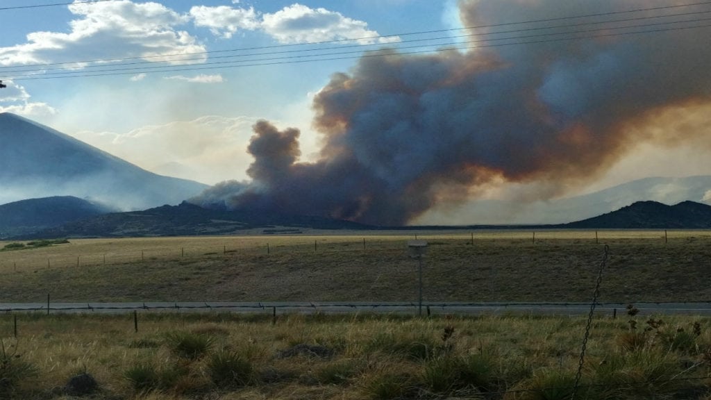 A massive plume burns near Silver Mountain as part of the Spring Fire on July 2, 2018.