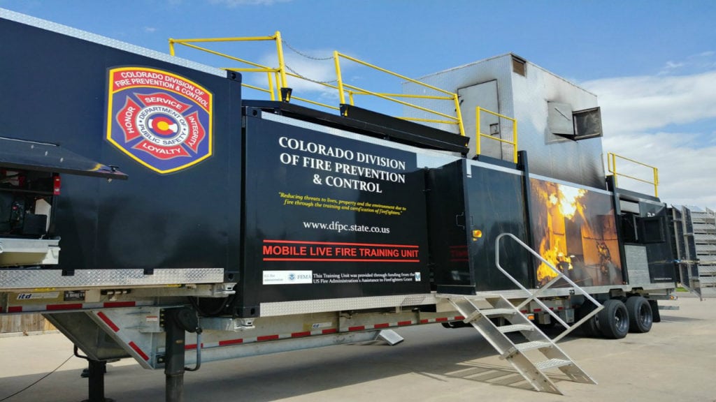 The Colorado Division of Fire Prevention and Control's Mobile Live Fire Training Unit is set up for training at the Canon City Area Fire Protection District Station One on August 22, 2018.