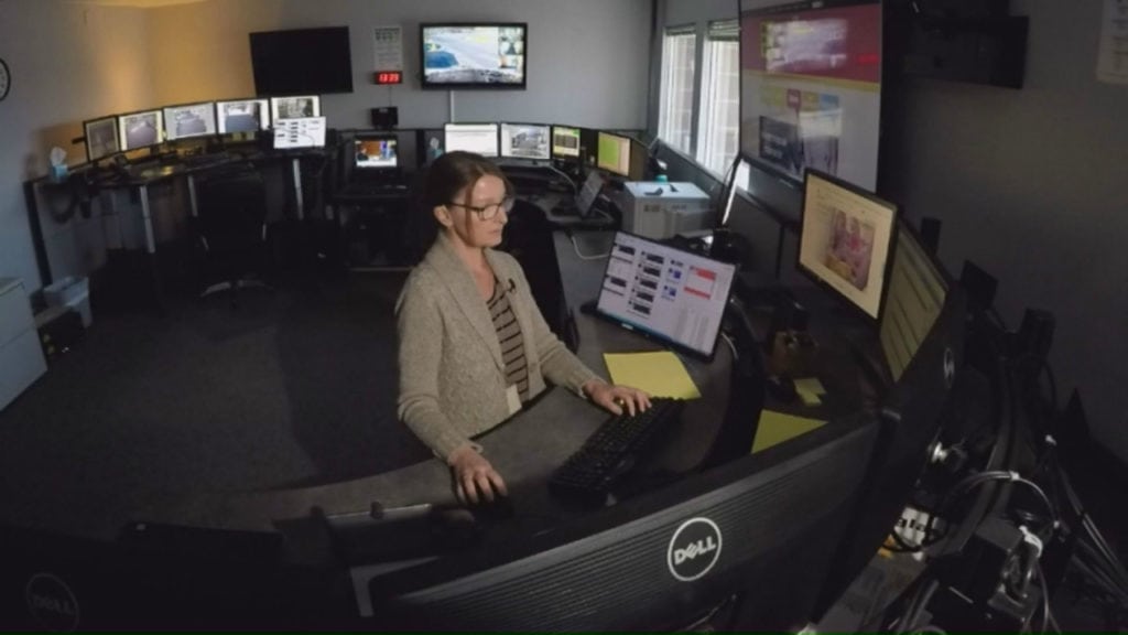 A dispatcher for Safe 2 Tell works inside the program's dispatch center. The program allows students, parents, teachers and more to anonymously report threats to life, including suicide threat reports.