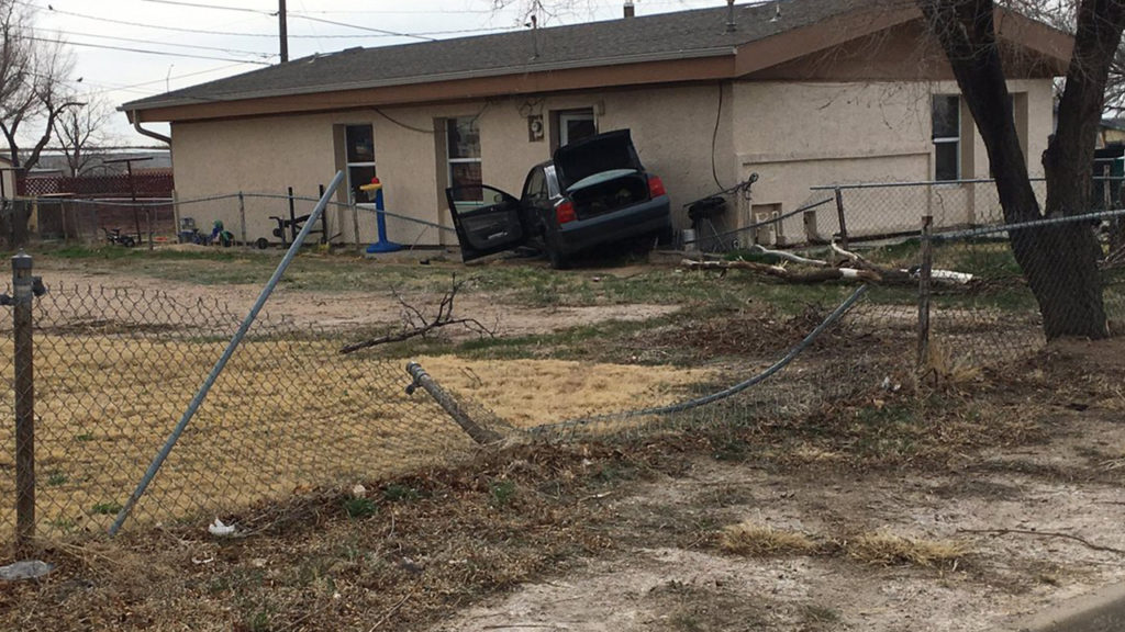 Pueblo car into house