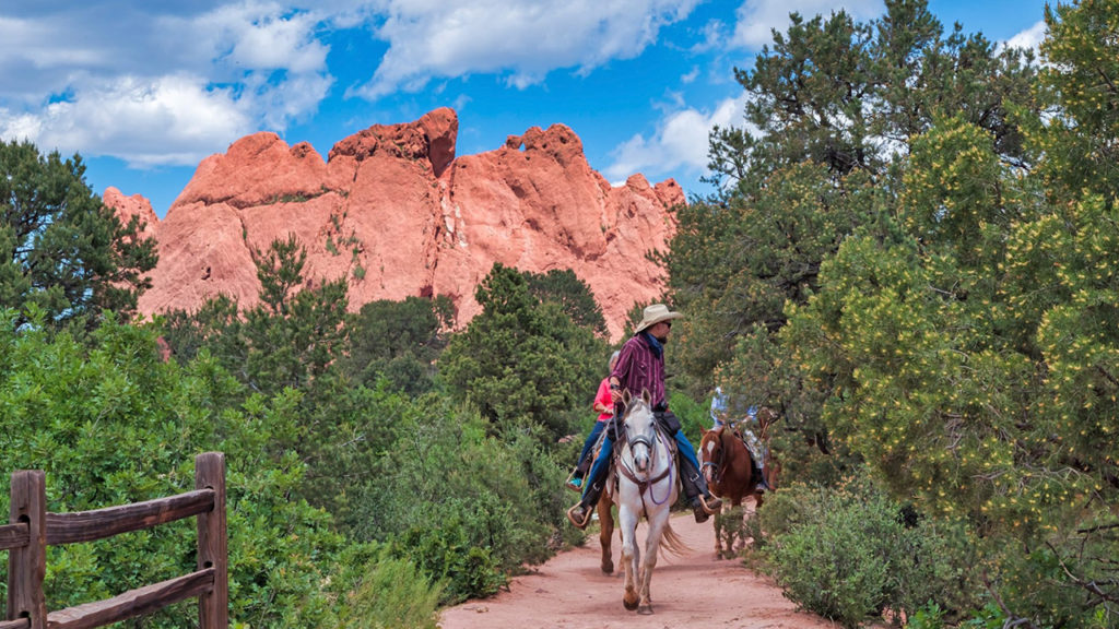 Horse Back Rides through Garden of the Gods by Larry Marr